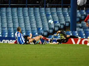 Sheffield Wednesday V Bristol City Prints: Keeper Adriano Basso saves from sheffield wednesday forward leon clarke