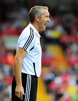 Keith Millen Directs Bristol City in 2011 Championship Battle against Portsmouth at Ashton Gate Stadium