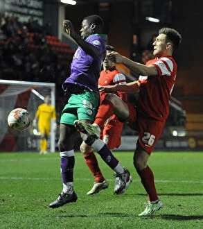 Images Dated 3rd March 2015: Kieran Agard vs Luke O'Neil: Intense Battle for the Ball in Leyton Orient vs