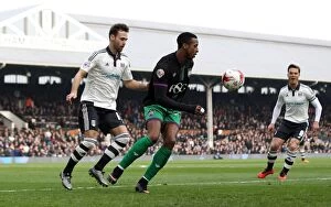 Images Dated 12th March 2016: Kodjia vs Tunnicliffe: Intense Battle at Craven Cottage - Sky Bet Championship