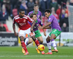 Korey Smith of Bristol City Closes Down Swindon Town's Jonathan Obika - Football Rivalry in League One