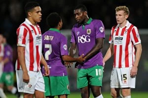 Images Dated 8th October 2014: Korey Smith and Jay Emmanuel-Thomas of Bristol City Share a Moment after Cheltenham Town Match
