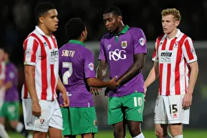 Korey Smith and Jay Emmanuel-Thomas of Bristol City Share a Moment after Cheltenham Town Match, October 8, 2014