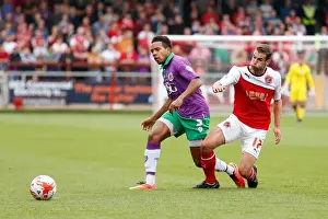 Fleetwood Town V Bristol City Prints: Korey Smith vs Matty Blair: Intense Moment in Fleetwood Town vs Bristol City Football Match