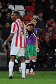 Images Dated 8th October 2014: Korey Smith's Double: Bristol City Celebrates in Cheltenham Town's Abbey Business Stadium