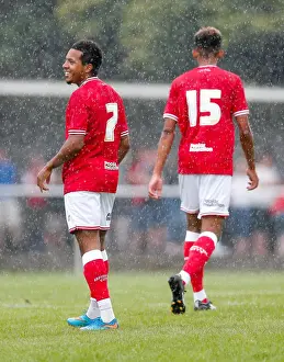 Framed Print : Korey Smith's Smiling Moment: Goal Scorer Celebrates in Preseason Community Match for Bristol City