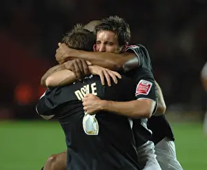 Lee Johnson celebrates with team mates david noble and marvin elliott