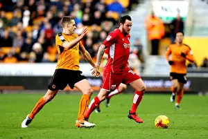 Wolverhampton Wanderers V Bristol City Prints: Lee Tomlin Outmaneuvers David Edwards: A Pivotal Moment in Wolverhampton Wanderers vs