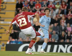 Bristol City V Manchester City Prints: Lee Trundle vs Manchester City: A Former Player's Return to the Field (Bristol City vs Manchester City)