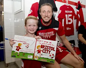 Bristol City V Wigan Athletic Prints: Luke Ayling Signs Autograph for Mascot: Bristol City vs Wigan Athletic, 2016