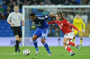 Images Dated 26th October 2015: Luke Freeman Closes In on Kagisho Dikgacoi in Intense Cardiff City vs