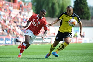 Images Dated 16th August 2014: Mark Little Chases Down Ben Gordon: A Football Intensity Moment at Ashton Gate