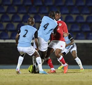 Images Dated 24th July 2014: Mark Little vs. Botswana: A Football Showdown in Gaborone - Bristol City's 2014 Tour