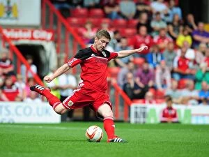 Images Dated 4th August 2012: Mark Wilson in Action at Louis Carey's Testimonial: Bristol City vs. Bristol Rovers (August 4, 2012)