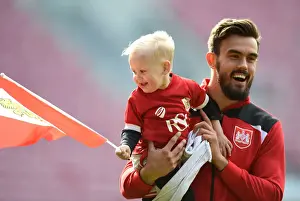 Framed Print : Marlon Pack of Bristol City Celebrates with Son after Championship Victory over Huddersfield Town - April 2016