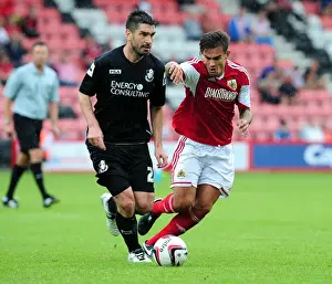 Marlon Pack of Bristol City Closes In on Bournemouth's Richard Hughes