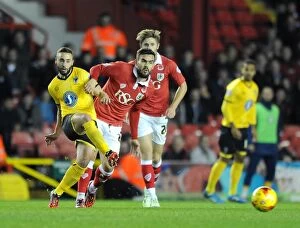 Images Dated 11th November 2014: Marlon Pack of Bristol City Closes Down Sammy Moore of AFC Wimbledon during Johnstone's Paint