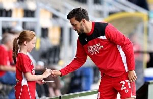 Images Dated 13th August 2016: Marlon Pack of Bristol City Signs Autograph for Fan at Burton Albion Match
