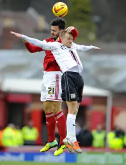 Maron Pack vs Ben Reeves: Aerial Clash in Bristol City vs MK Dons Football Match