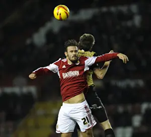 Bristol City V Leyton Orient Prints: Maron Pack vs. David Mooney: Intense Battle for the Ball at Ashton Gate