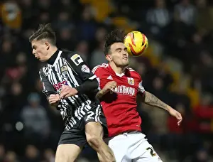 Notts County V Bristol City Prints: Maron Pack vs Jack Grealish: Aerial Battle in Notts County vs Bristol City Football Match