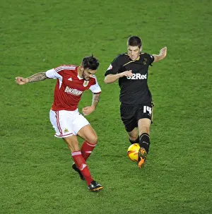 Bristol City V Crawley Town Prints: Maron Pack vs. Jamie Proctor: Intense Battle in Cardiff City vs