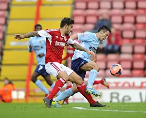 Bristol City V Dagenham And Redbridge Prints: Maron Pack vs. Luke Howell: Intense Battle for Ball Possession in Bristol City vs