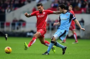 Maron Pack vs Richard Wood: Intense Battle for Ball at Ashton Gate