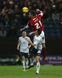 Preston North End V Bristol City Prints: Maron Pack Wins Aerial Battle Against Josh Brownhill in Preston North End vs