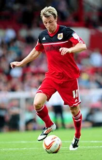 Images Dated 25th August 2012: Martyn Woolford in Action: Bristol City vs. Cardiff City, Championship Match