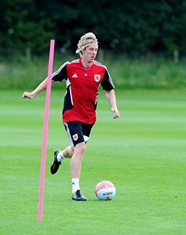 Images Dated 4th July 2011: Martyn Woolford of Bristol City: A Focused Figure in Pre-season Training