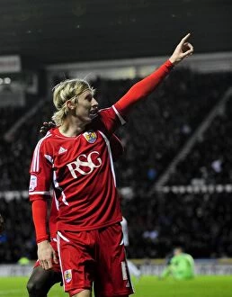 Images Dated 10th December 2011: Martyn Woolford Scores: Bristol City's Championship Victory over Derby County on 10/12/2011