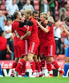 Louis Carey Testimonial Prints: Martyn Woolford Scores the Thriller in Louis Carey's Testimonial Match vs