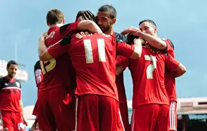 Martyn Woolford's Double Strike: Ecstatic Celebration with Bristol City Team