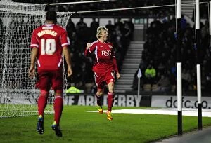Images Dated 10th December 2011: Martyn Woolford's Thrilling Goal Celebration: Derby County vs. Bristol City (Championship 2011)