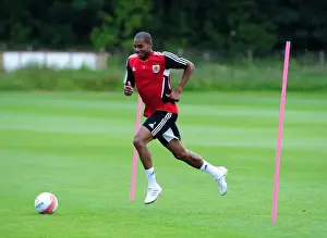 Pre-season Training Prints: Marvin Elliott: Bristol City's Focused Player Gearing Up for Pre-Season Training