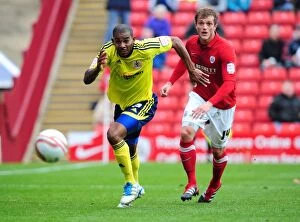 Images Dated 29th October 2011: Marvin Elliott Chases Ball in Championship Match: Barnsley vs. Bristol City (2011)