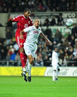Images Dated 10th November 2010: Marvin Elliott Claims Aerial Victory: Swansea City vs. Bristol City, Championship 2010
