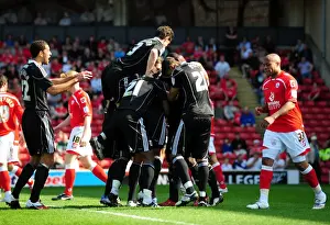 Framed Print : Marvin Elliott Scores the Thrilling Opener: Championship Clash at Oakwell Stadium (Barnsley vs. Bristol City, 09 / 04 / 2011)