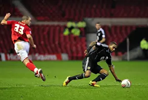 Nottingham Forest V Bristol City Prints: Marvin Elliott Tackles Joel Lynch in Intense Forest vs. Bristol City Championship Clash