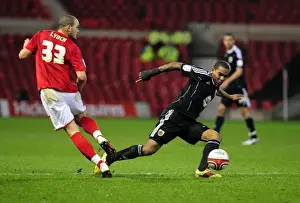 Framed Print : Marvin Elliott Tackles Joel Lynch: Intense Moment in Nottingham Forest vs. Bristol City Football Match, Npower Championship, 2011