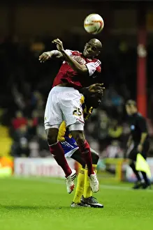 Bristol City V Brentford Prints: Marvin Elliott vs. Clayton Donaldson: Heading Battle at Ashton Gate - Bristol City vs