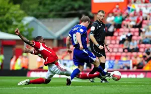 Bristol City V Ipswich Town Prints: Marvin Elliott vs Grant Leadbitter: Intense Championship Battle at Ashton Gate Stadium (06/08/2011)