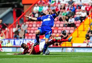 Bristol City V Ipswich Town Prints: Marvin Elliott vs Lee Bowyer: Intense Championship Showdown at Ashton Gate, 2011