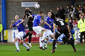 Carlisle United V Bristol City Prints: Marvin Elliott's Determined Heading: Carlisle United vs