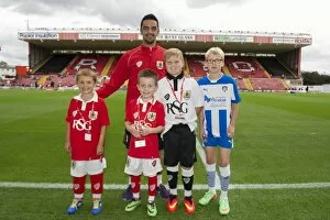 Images Dated 16th August 2014: Mascots in Action: Bristol City vs. Colchester United, Ashton Gate, 2014
