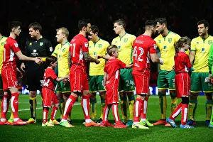 Mascots of Bristol City and Norwich City Football Clubs Shake Hands at Ashton Gate