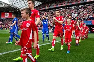 Mascots Lead Out Bristol City and Birmingham City Teams at Ashton Gate Stadium