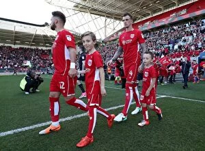 Images Dated 22nd April 2017: Mascots Lead the Way: Sky Bet Championship Clash between Bristol City and Barnsley at Ashton Gate
