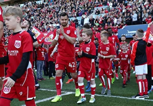 Images Dated 22nd April 2017: Mascots Leading Out Bristol City and Barnsley Teams at Ashton Gate